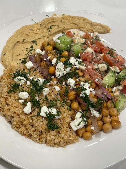 Bulgur bowl, chickpeas, hummus, and feta salad,